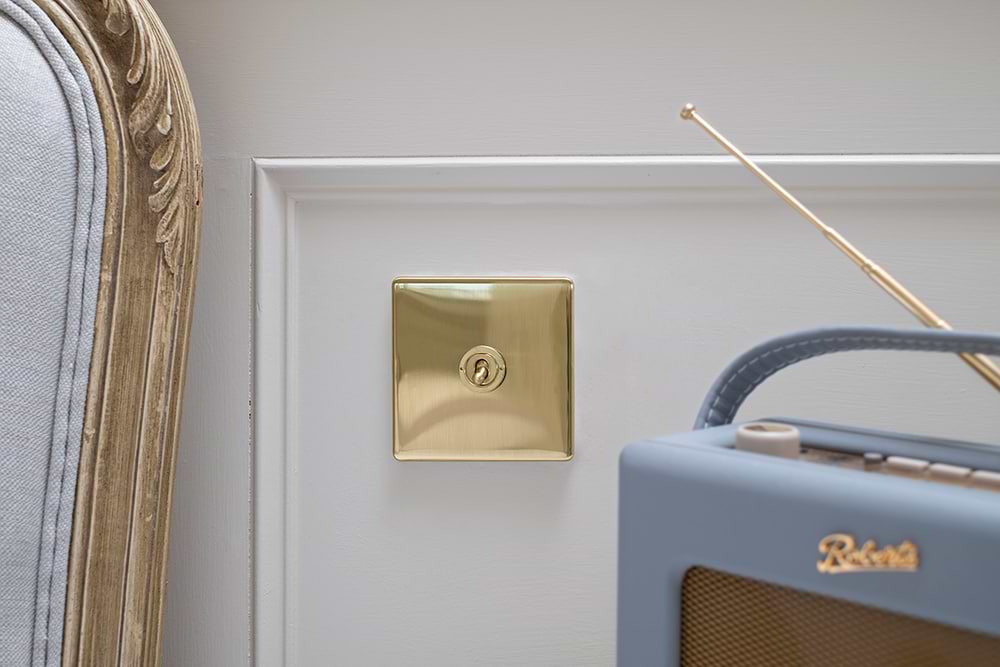 The Savoy Collection Brushed Brass 1 Gang Intermediate Toggle Switch Screwless