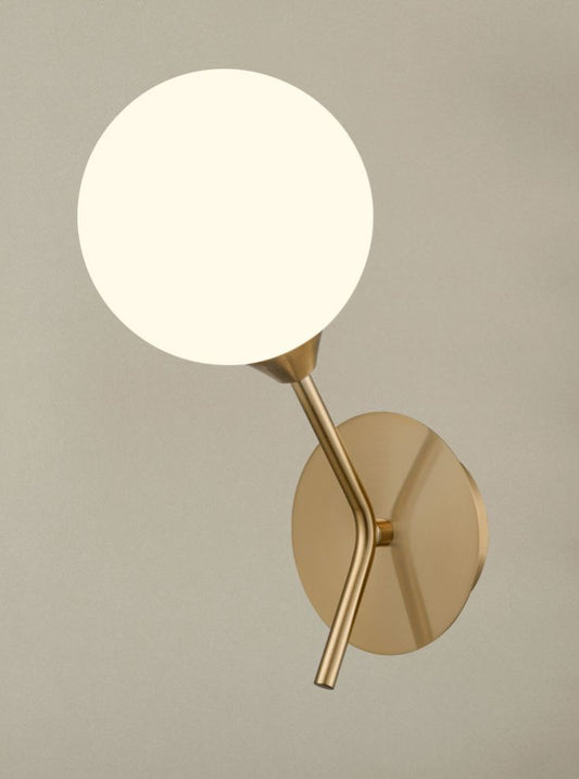 Cosmic 1 light wall bracket in antique gold with matt opal glass