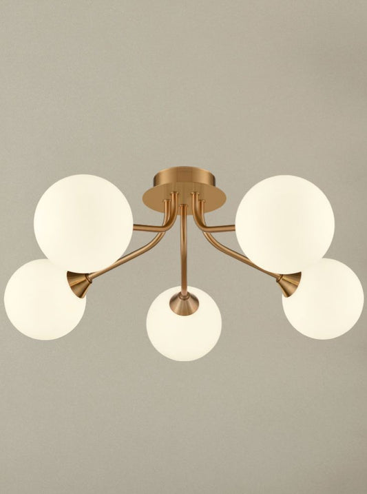 Cosmic 5 light fitting in antique gold with matt opal glass
