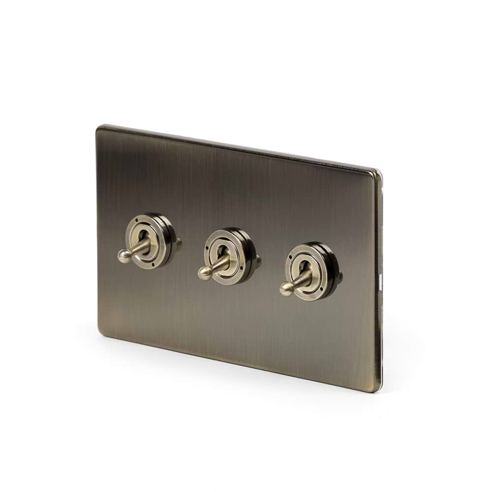 The Charterhouse Collection 3 Gang Intermediate Toggle Switch Screwless Antique Brass