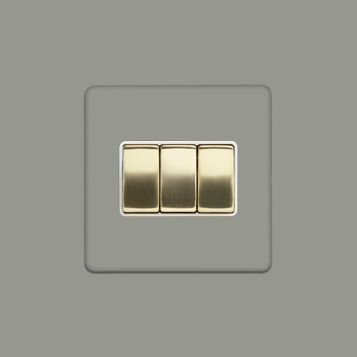 Soho Lighting Primed Paintable 3 Gang Intermediate switch with Brushed Brass Switch with White Insert