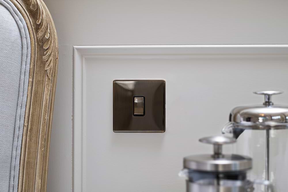 The Charterhouse Collection 1 Gang Light Switch 2 Way 10A Black Insert Antique Brass