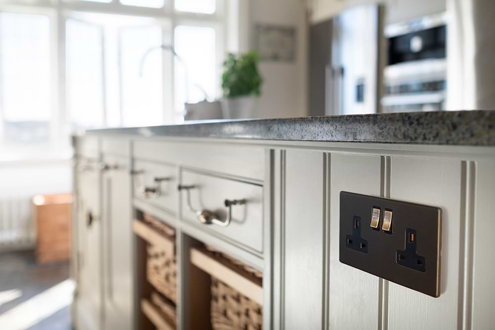 Soho Lighting Bronze & Brushed Brass 13A 2 Gang Switched Socket, DP Black Inserts Screwless