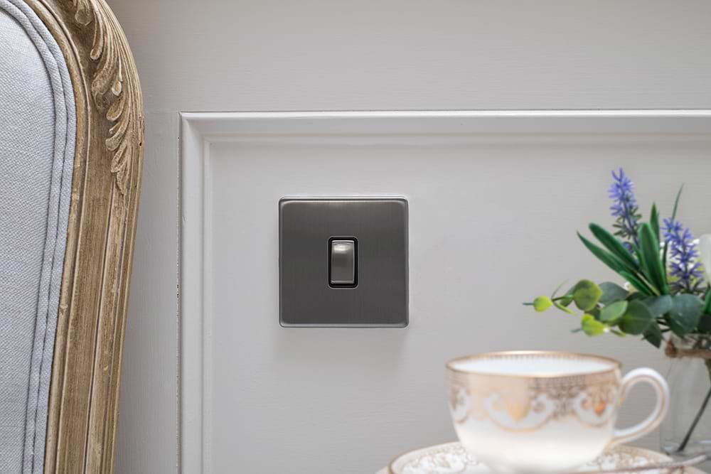 The Lombard Collection Brushed Chrome 1 Gang Intermediate Switch Black Ins 10A Screwless