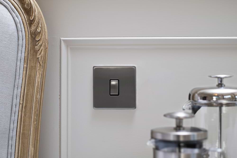 The Lombard Collection Brushed Chrome 10A 1 Gang 2 Way Switch with Black Insert Screwless