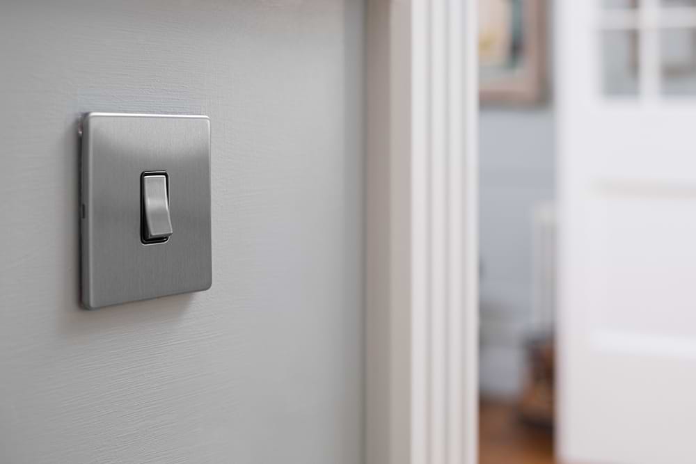 The Lombard Collection Brushed Chrome 10A 1 Gang 2 Way Switch with Black Insert Screwless