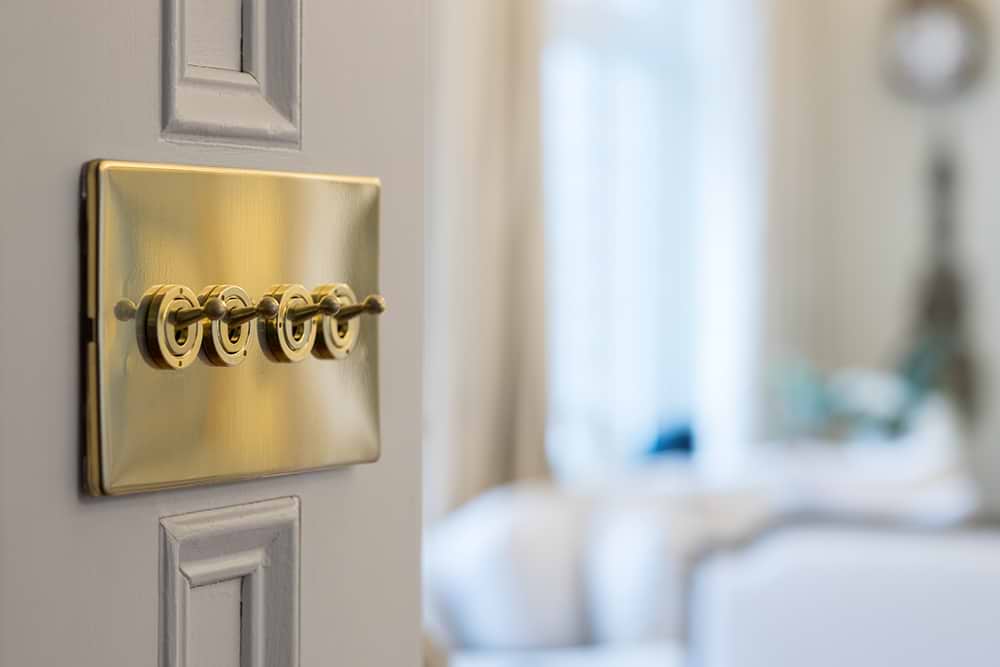 The Savoy Collection Brushed Brass 4 Gang 2 Way Toggle Switch Screwless