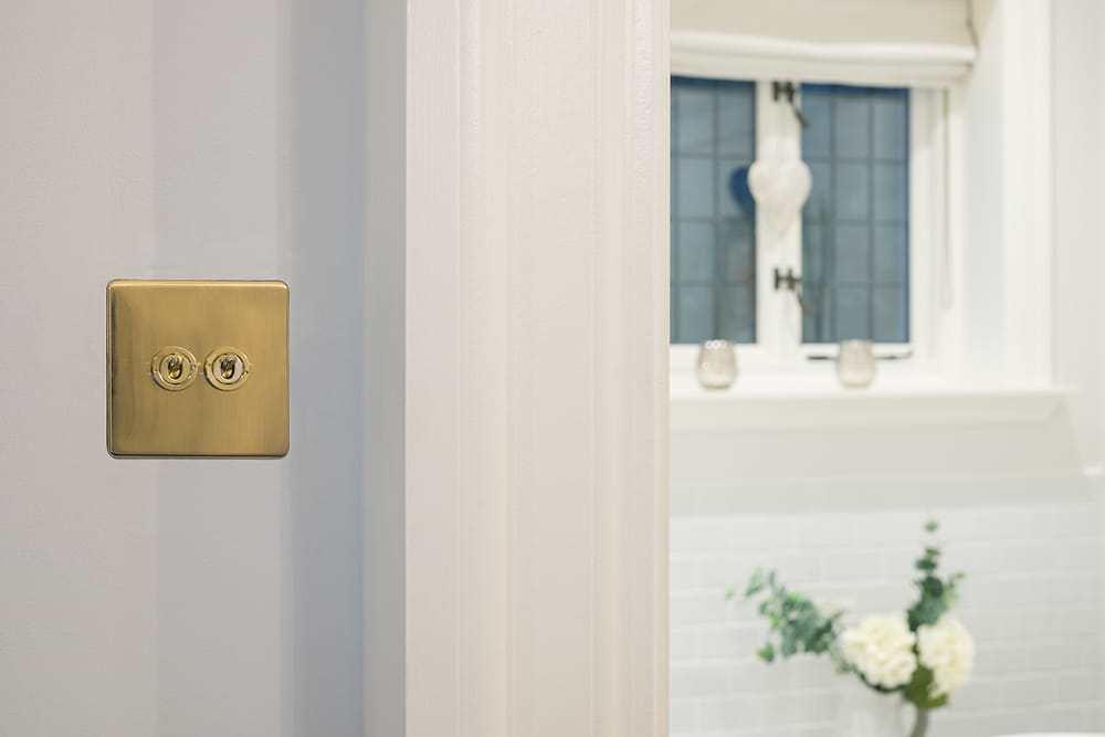 The Savoy Collection Brushed Brass 2 Gang 2 Way Toggle Switch Screwless