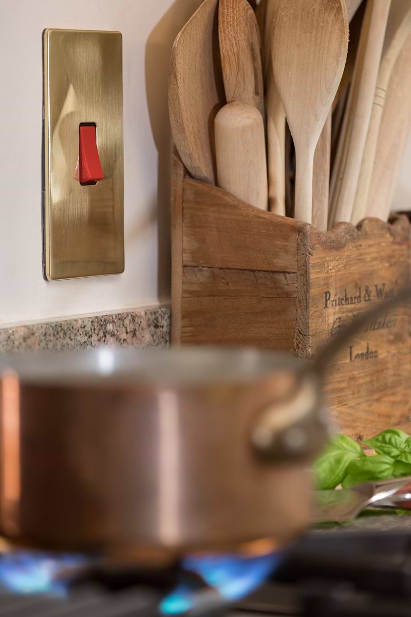 The Savoy Collection Brushed Brass 45A 1 Gang Double Pole Switch Large Plate Blk Ins Screwless