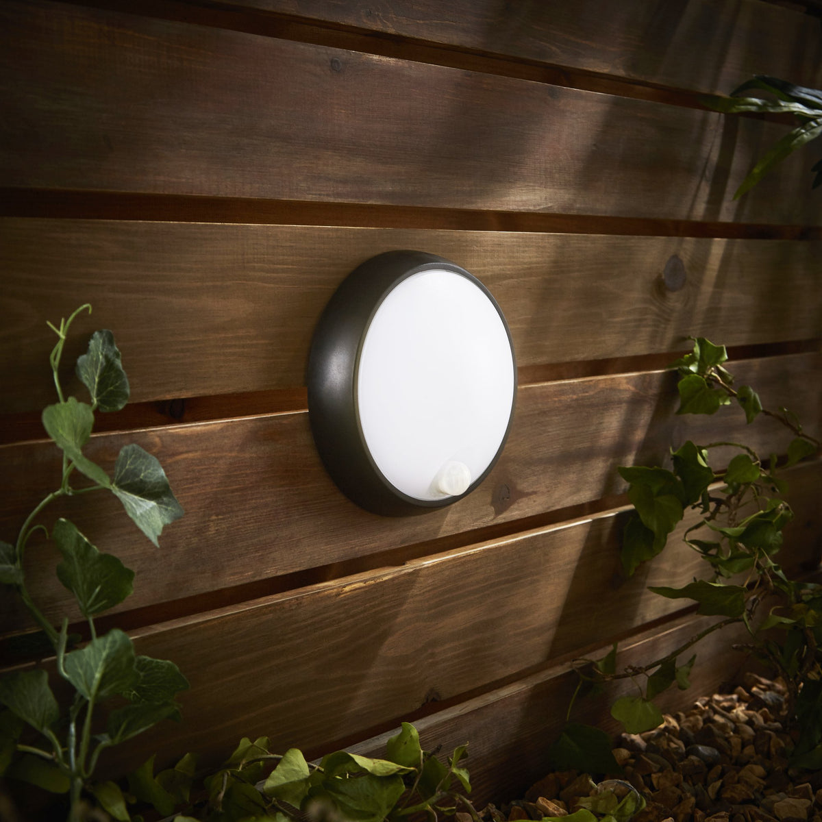 Cano 8 Watt LED Outdoor Round Bulkhead with PIR Sensor, Black