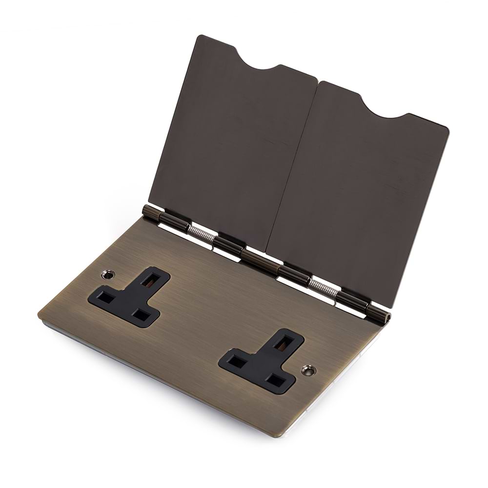 The Charterhouse Collection 13A 2Gang Floor Socket Blk Ins Antique Brass