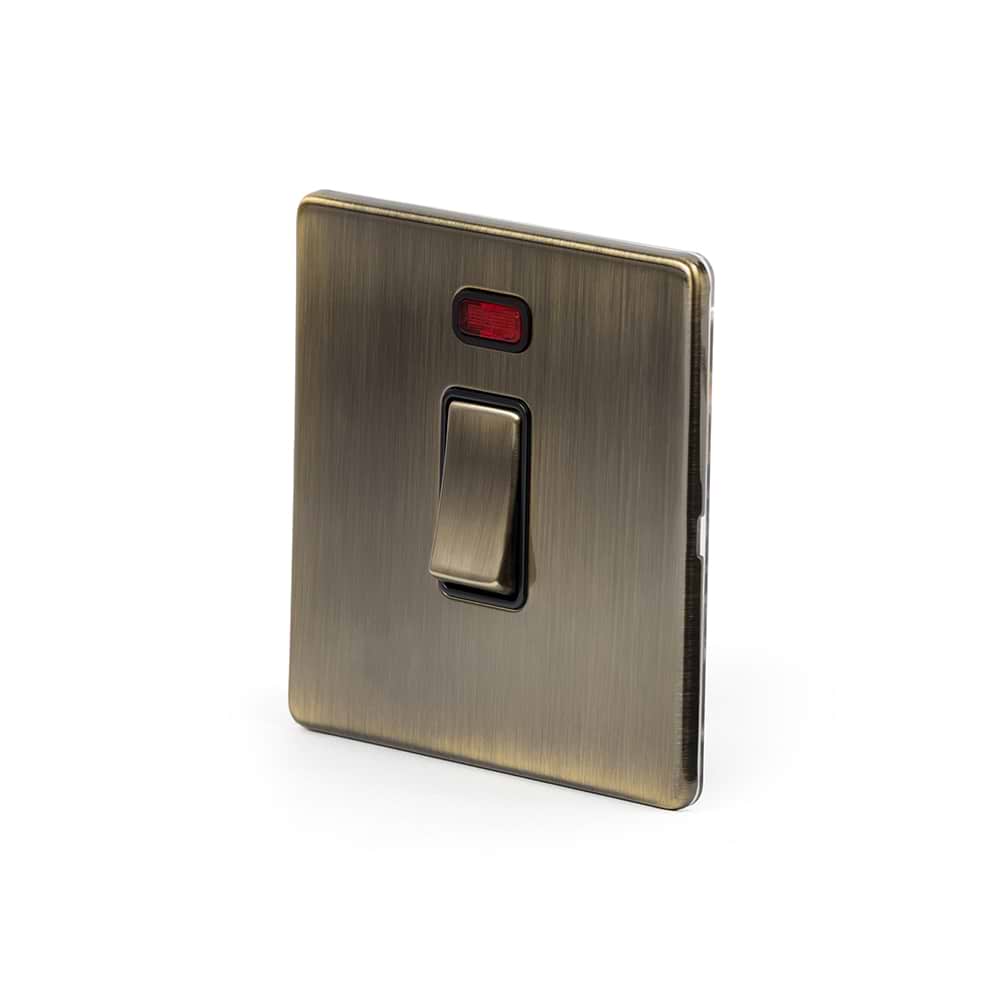 The Charterhouse Collection 20A 1 Gang Double Pole Switch With Neon Blk Ins Screwless  Antique Brass