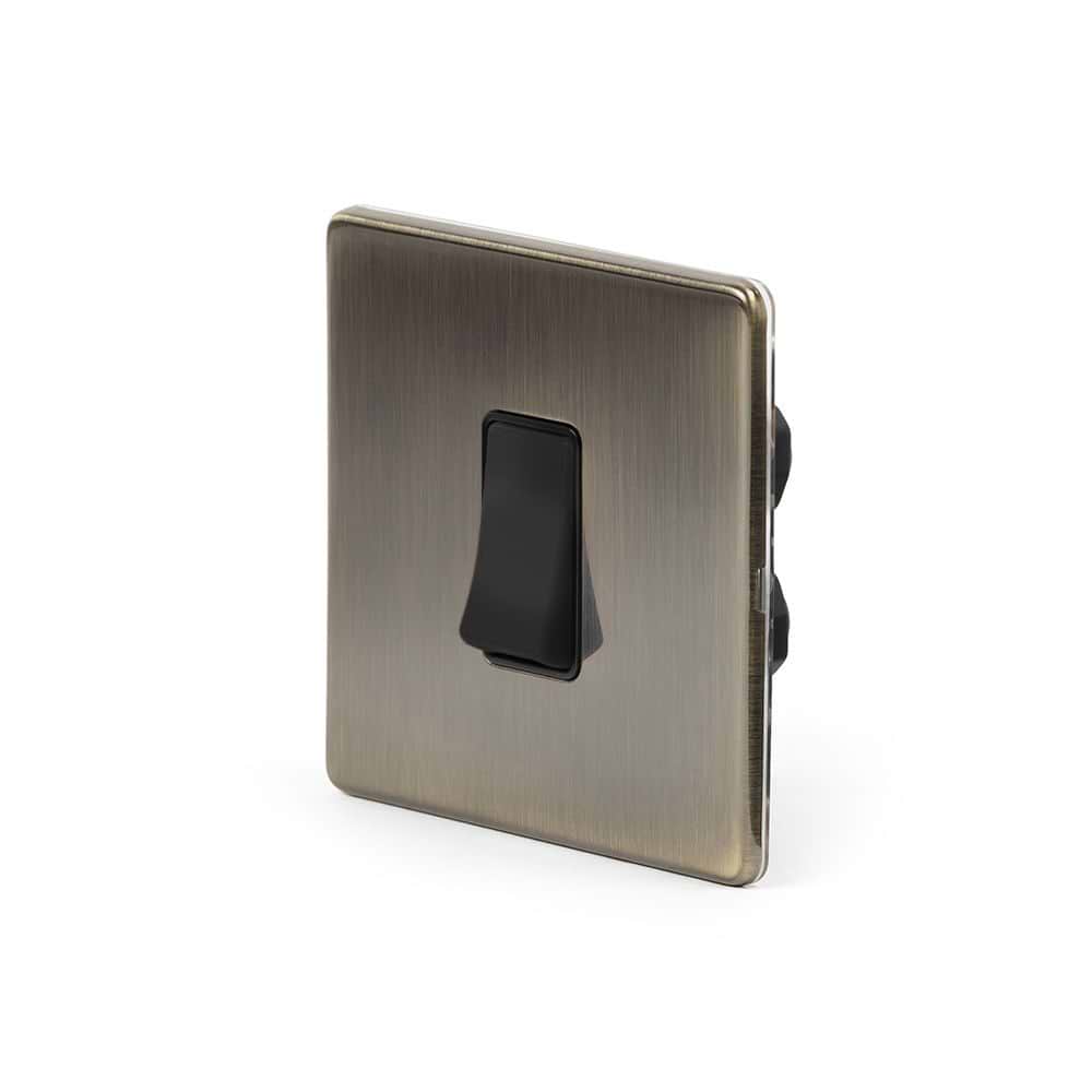 The Charterhouse Collection 45A 1 Gang Double Pole Switch Single Plate Blk Ins Screwless Antique Brass