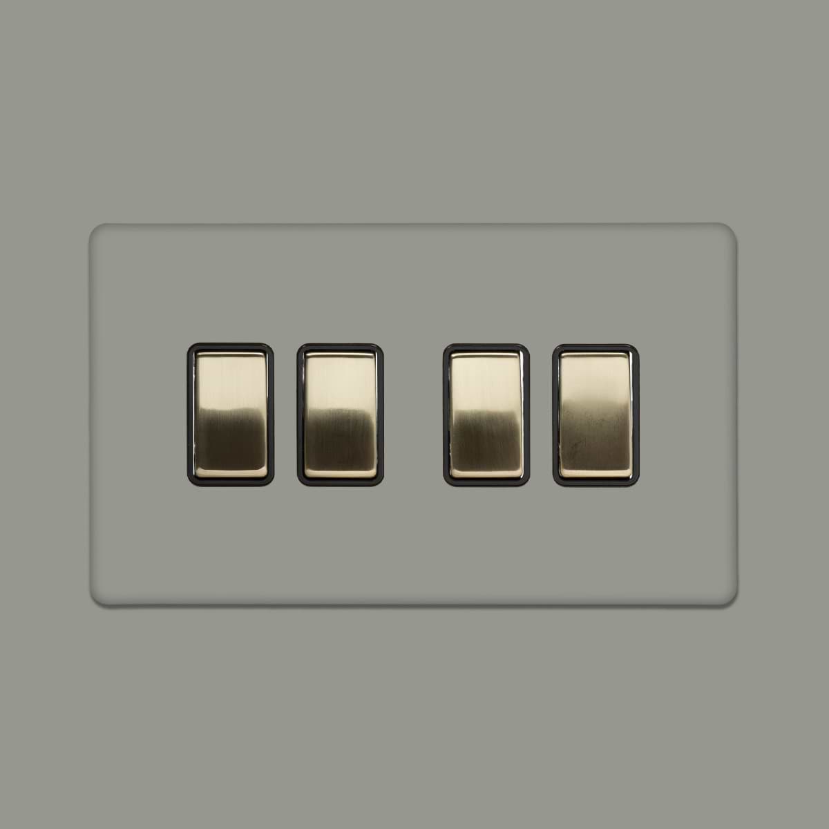 Soho Lighting Primed Paintable 4 Gang Intermediate switch with Brushed Brass Switch with Black Insert