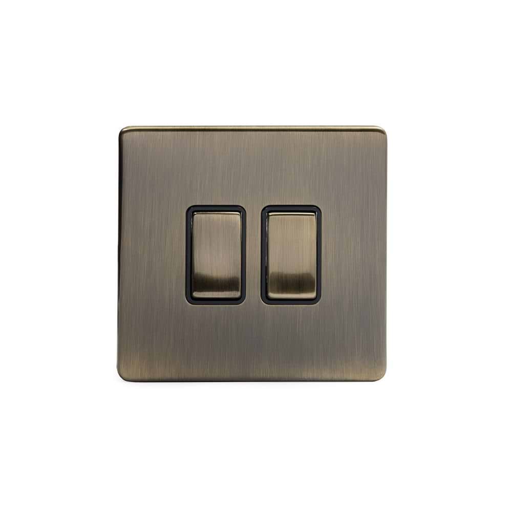 The Charterhouse Collection 2 Gang Retractive Switch Blk Ins Screwless Antique Brass