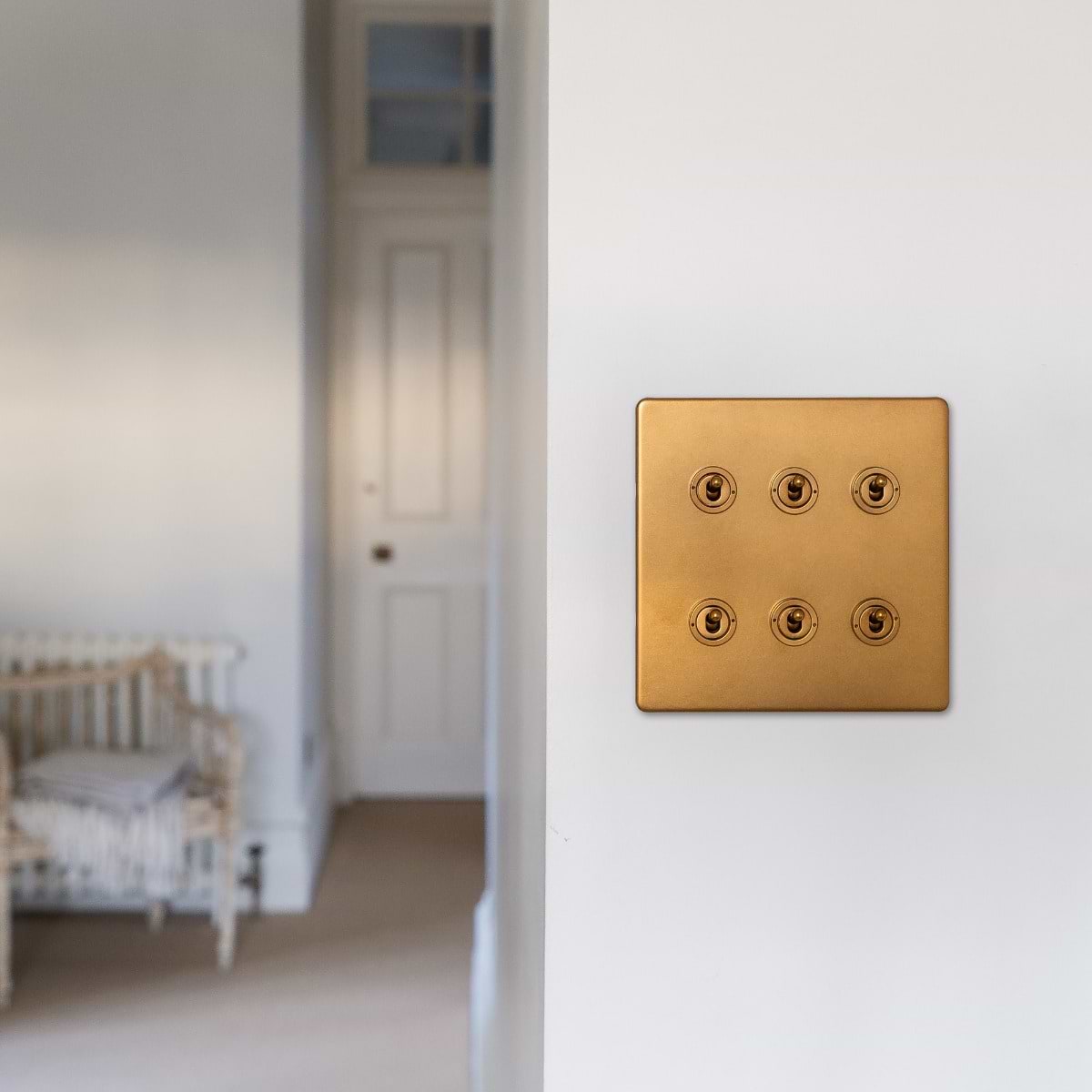 The Sloane Collection Antique Gold 6 Gang Toggle Light Switch 20A 2 Way