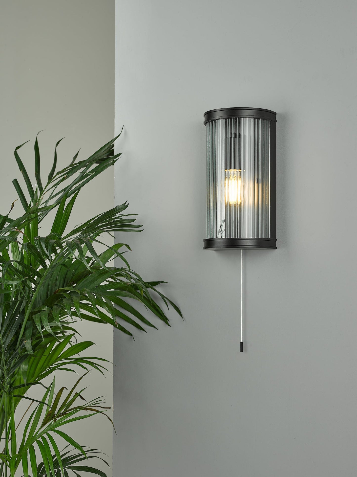 dar lighting Anund Bathroom Wall Light Matt Black Ribbed Glass IP44 ANU0722