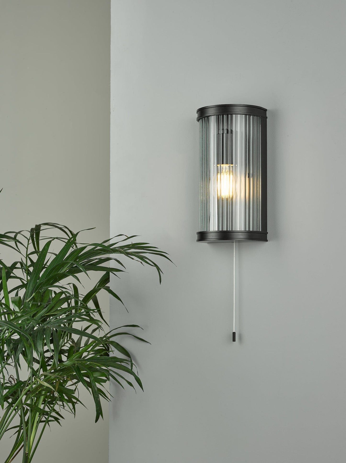 dar lighting Anund Bathroom Wall Light Matt Black Ribbed Glass IP44 ANU0722